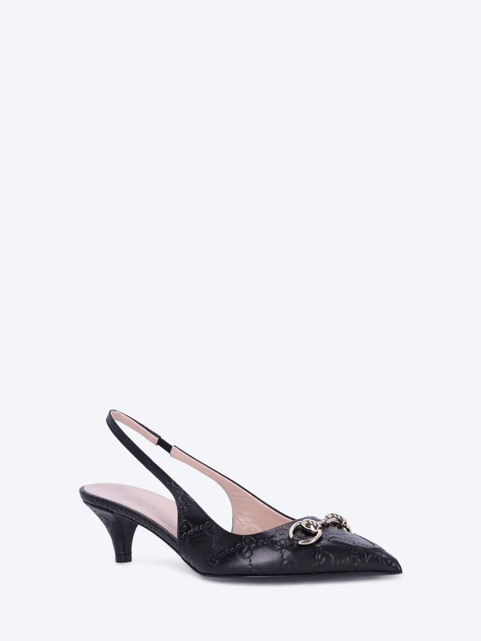 Horsebit slingback pump
